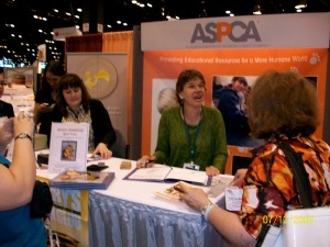 Signing books at the ASPCA booth. 