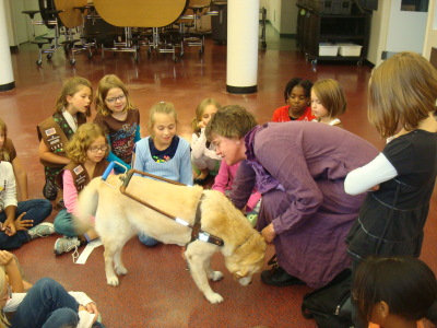 Showing the girls how the harness works. 