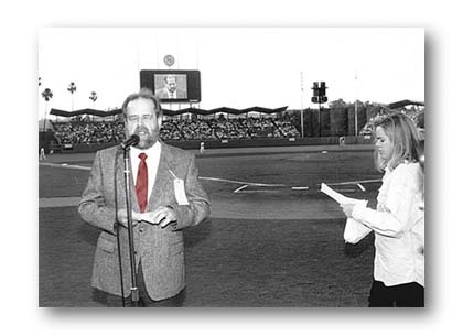 That's Bob--Molly's dad--announcing the lineups (reading from a Braille lineup card) at Dodger Stadium.