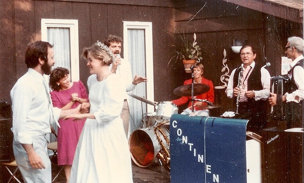 Dancing on our wedding day. Roland Kwasny and the Continentals played. On this number, Beth's sister Bev sat in on the drums, our friend Keith Pickerel was crooning, and the lovely woman in red next to him is Ree Stone. 
