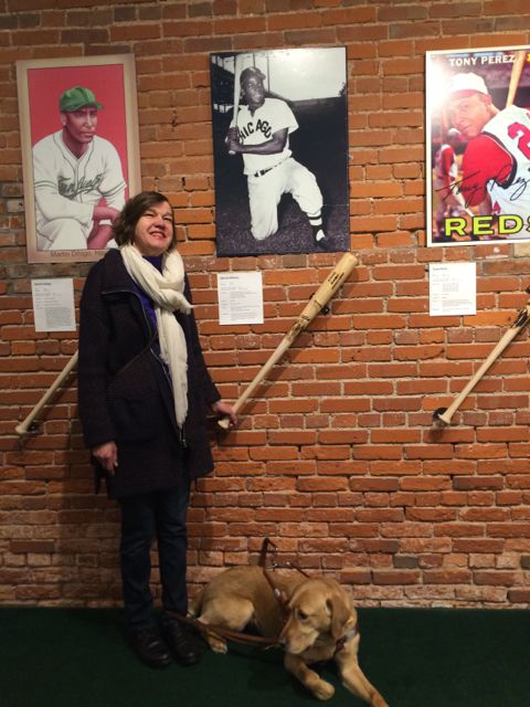 The Louisville Slugger museum and tour is terrific. We saw them making some major-leaguer's bats. And we stopped, here, for the special exhibit on Cuban-born MLB players. Beth's next to the Minnie Minoso, a Cuban-born White Sox great. 