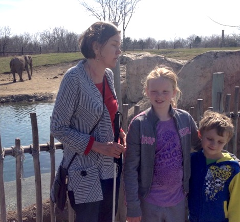 That's Floey and Ray with Great Aunt Beth at the Indianapolis zoo. We didn't catch the elephant's name.