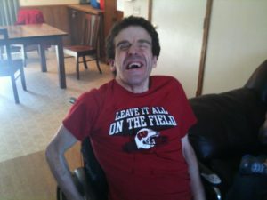 Photo of Gus in his Badgers t-shirt.