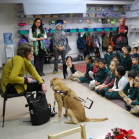 photo of Beth speaking to elementary school class