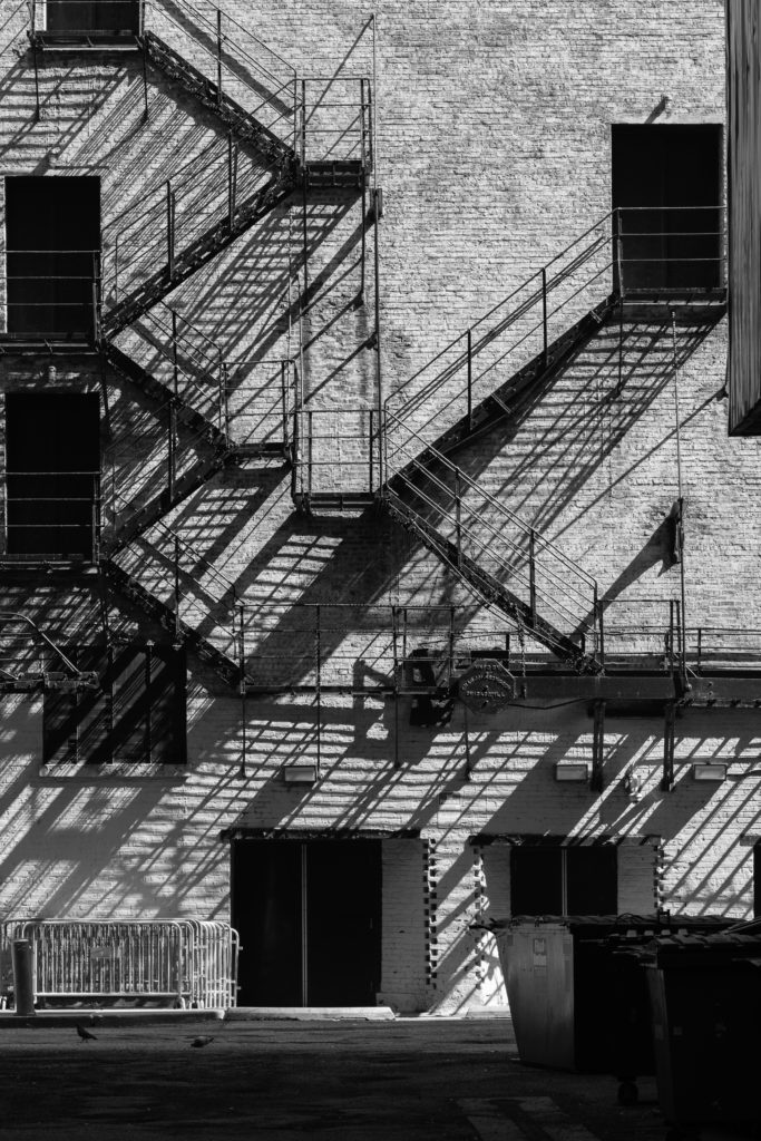 image of fire escapes in shadow